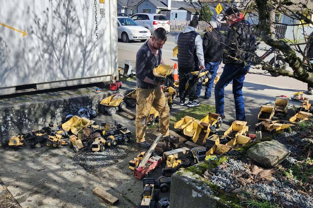 Over 100 people stopped by Erik Berbenuik&rsquo;s Langford home to pick up and take home one of nearly 150 Tonka trucks from his yard. (Courtesy of Erik Berbenuik)